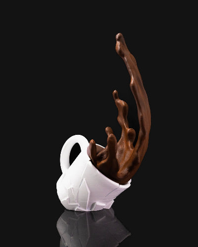 Skulptur „Falling Coffee Cup“